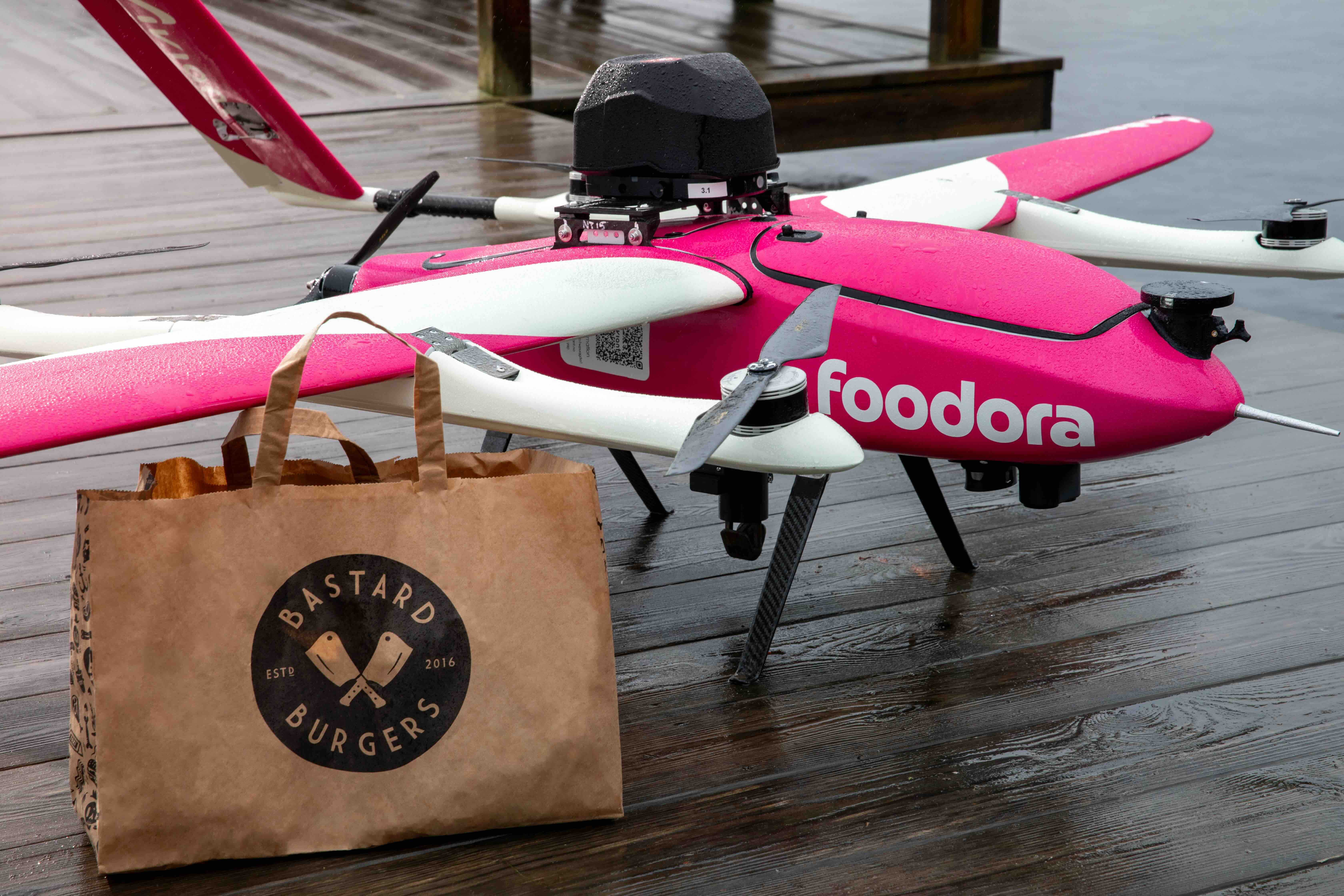 A Foodora-branded Aviant-drone, with a bag from Bastard Burger